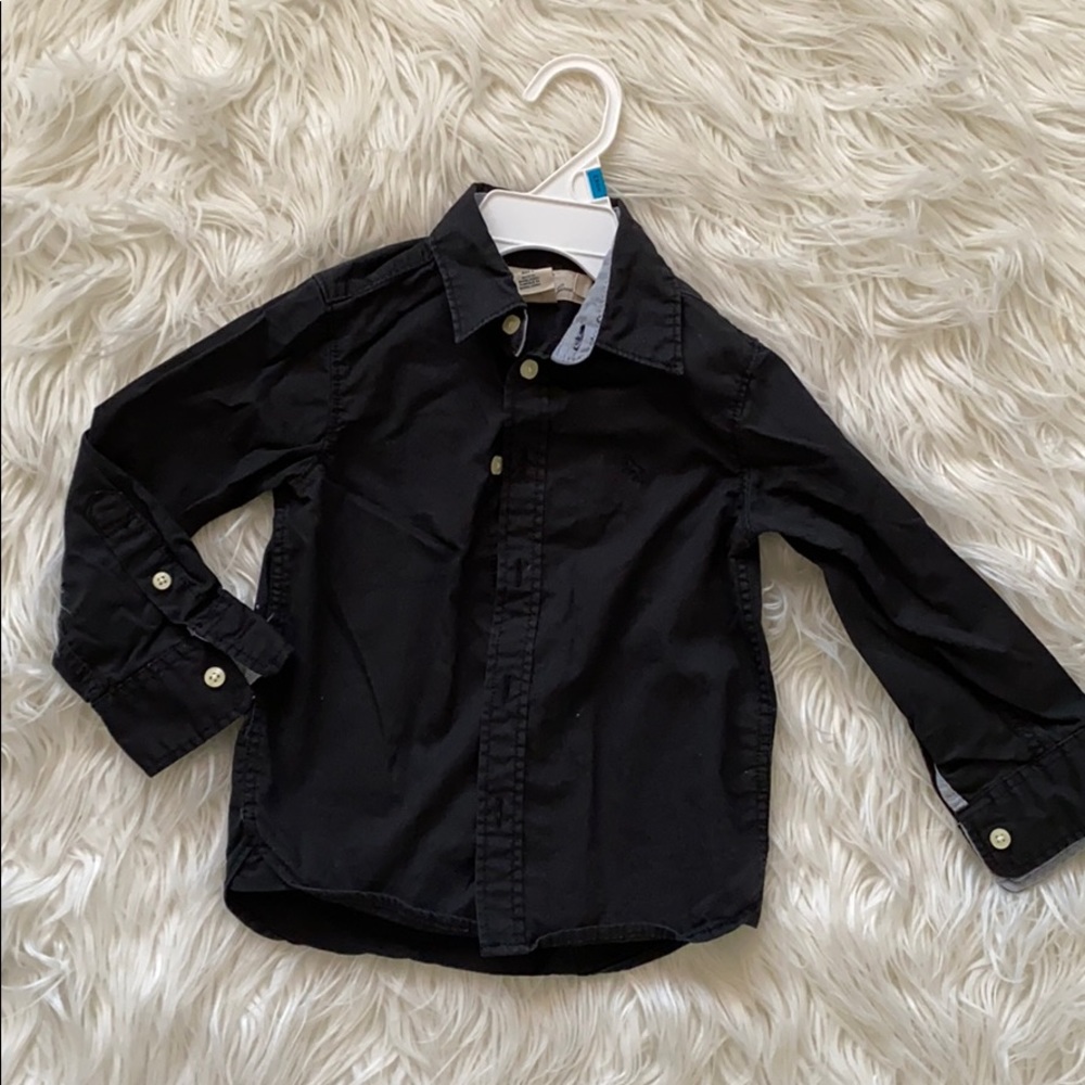 Lightly worn boy button down shirt.